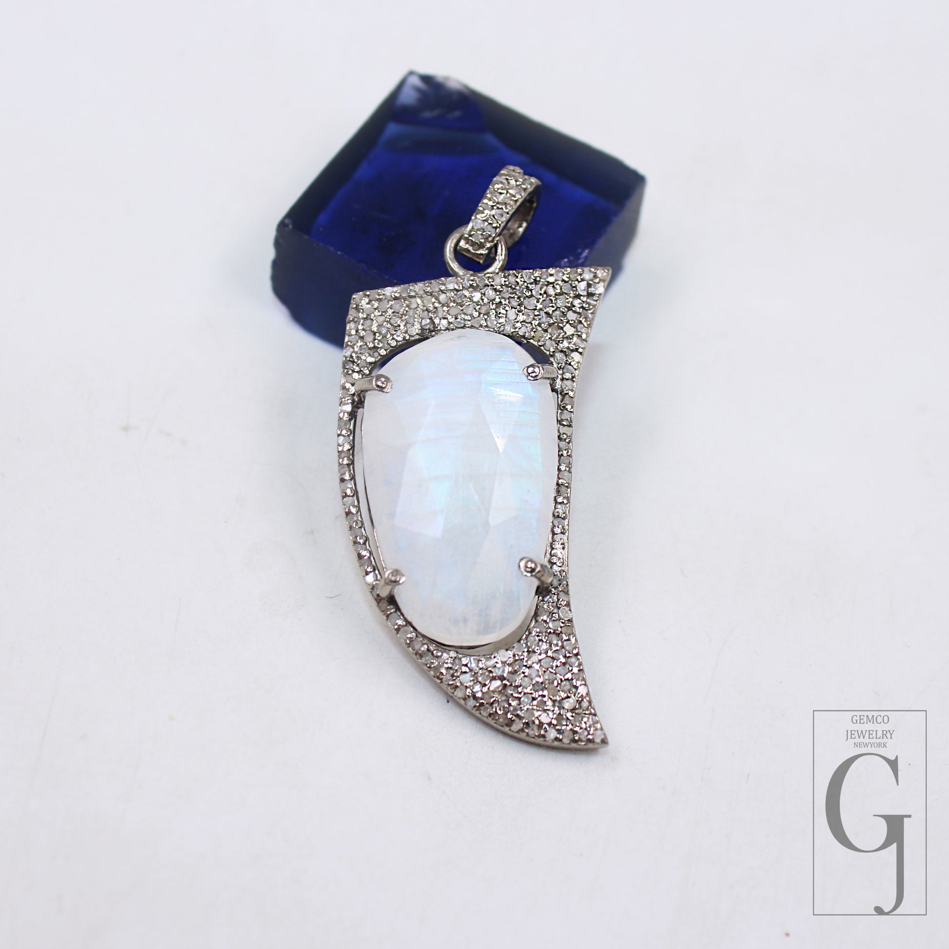 Statement moonstone pendant with diamond accents