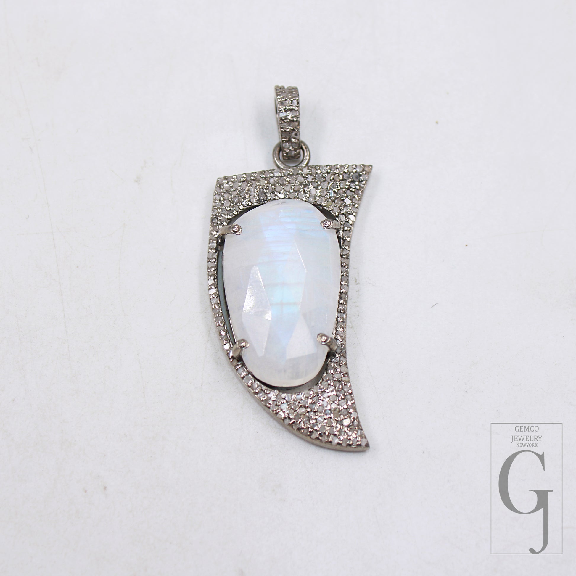 silver moonstone pendant with rosecut diamonds