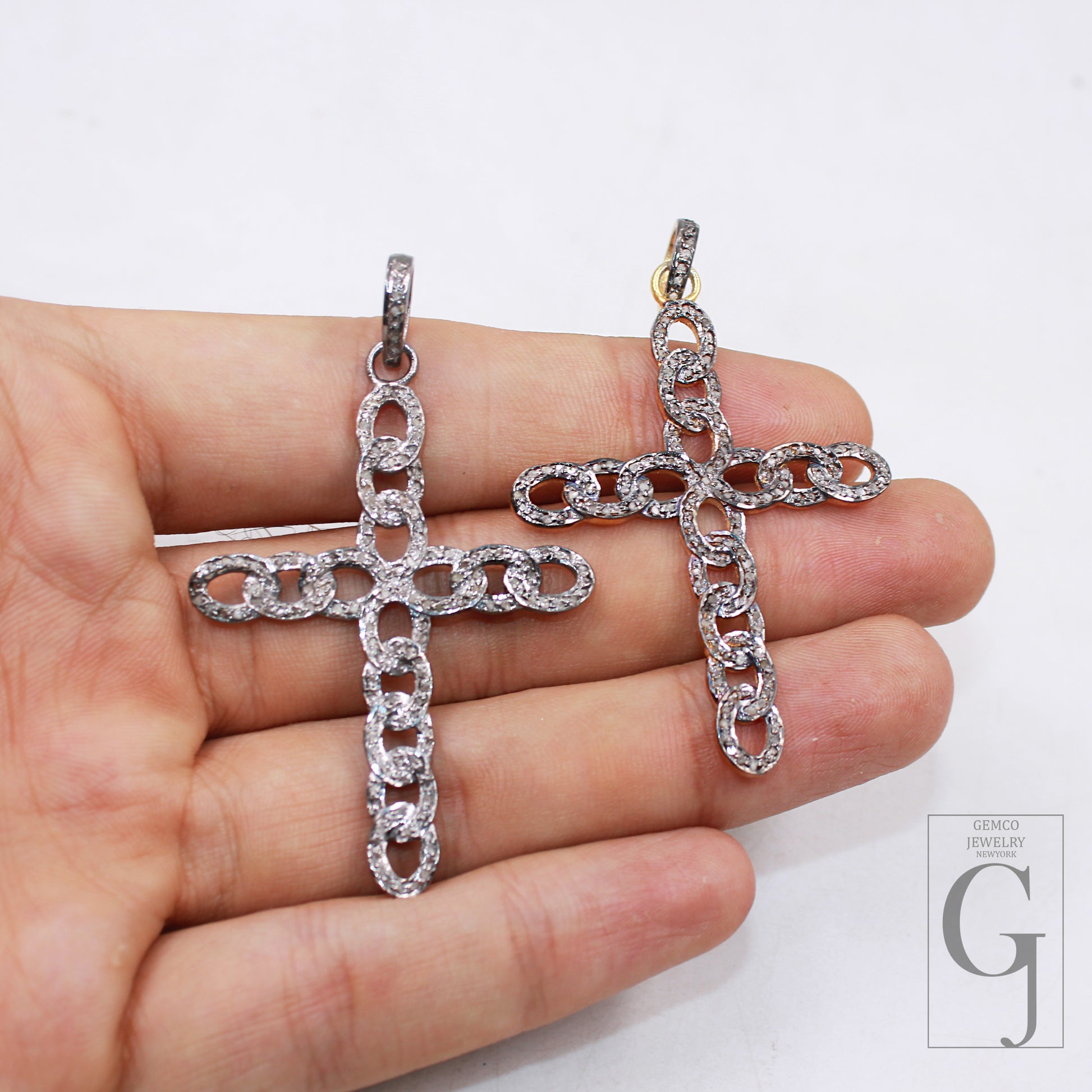 Artisan-crafted diamond cross pendant in chain pattern
