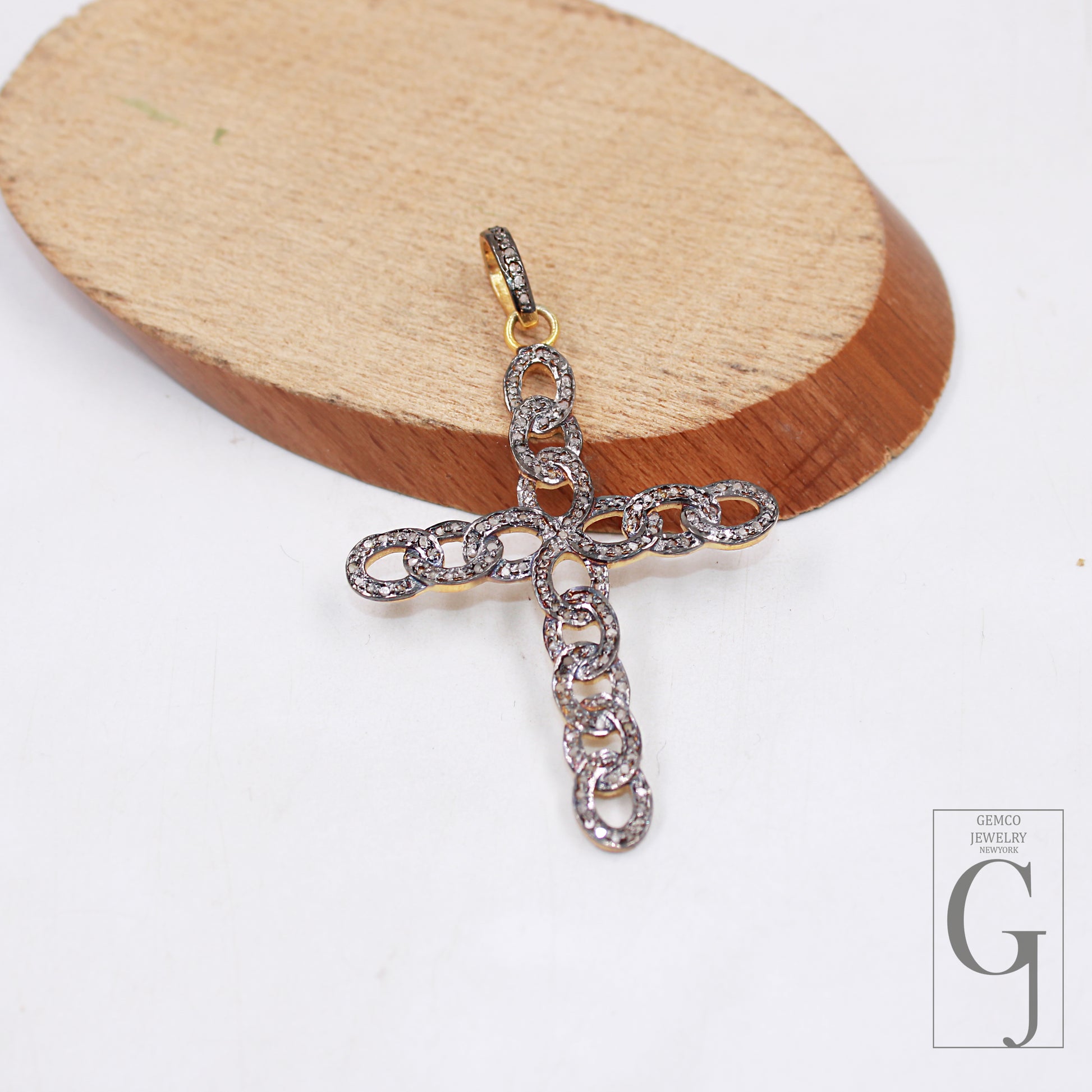 Faith cross charm with natural conflict-free diamonds