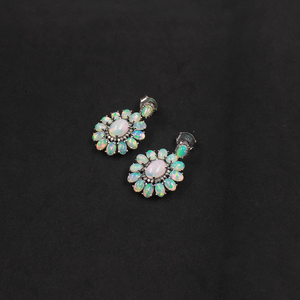 Luxury gemstone earrings with Ethiopian opals and pave diamonds
