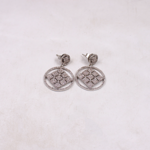 Modern geometric diamond drop earrings with artisan design