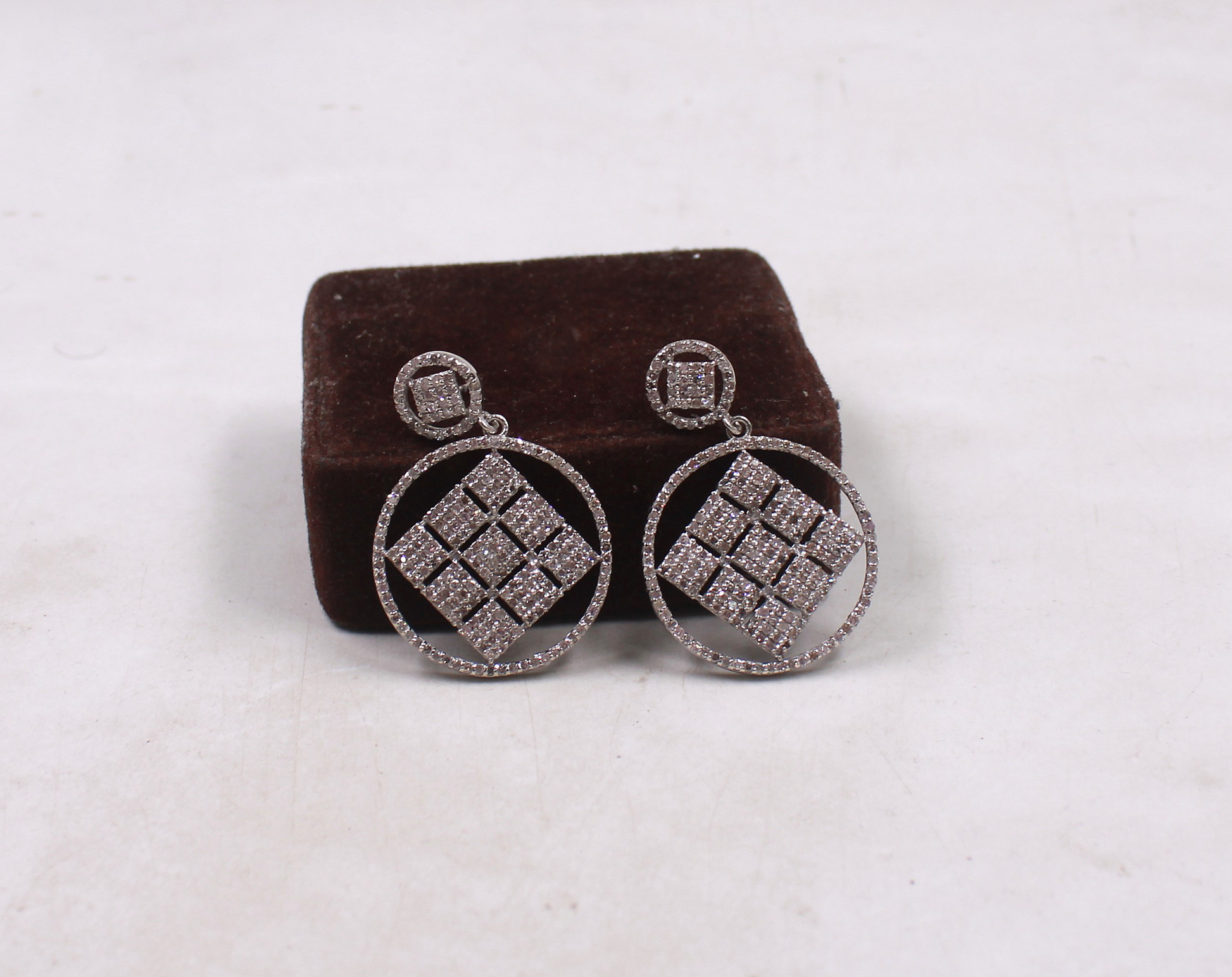 Unique artisan diamond drop earrings in sterling silver