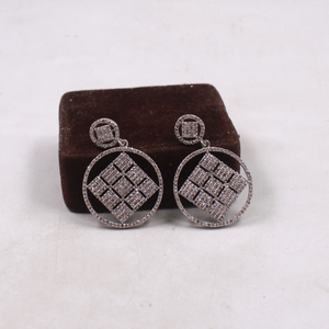 Unique artisan diamond drop earrings in sterling silver