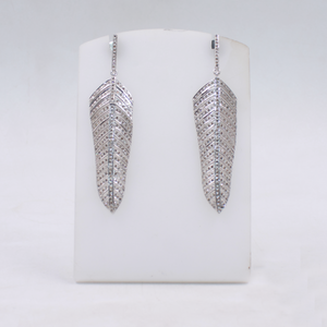Handmade diamond feather earrings in sterling silver