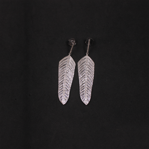 Elegant feather-inspired pave diamond drop earrings