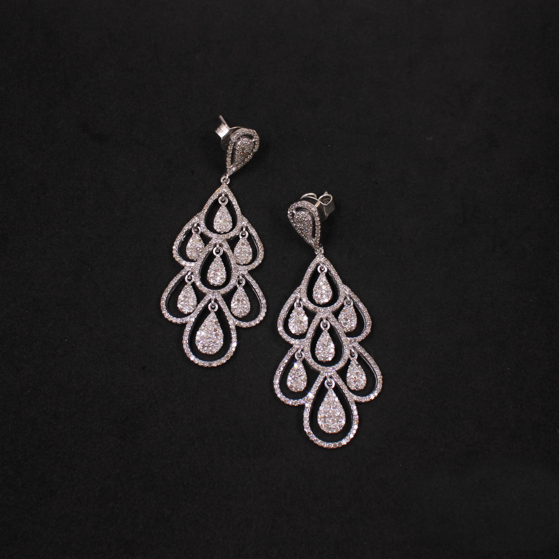 Handmade diamond teardrop earrings in sterling silver