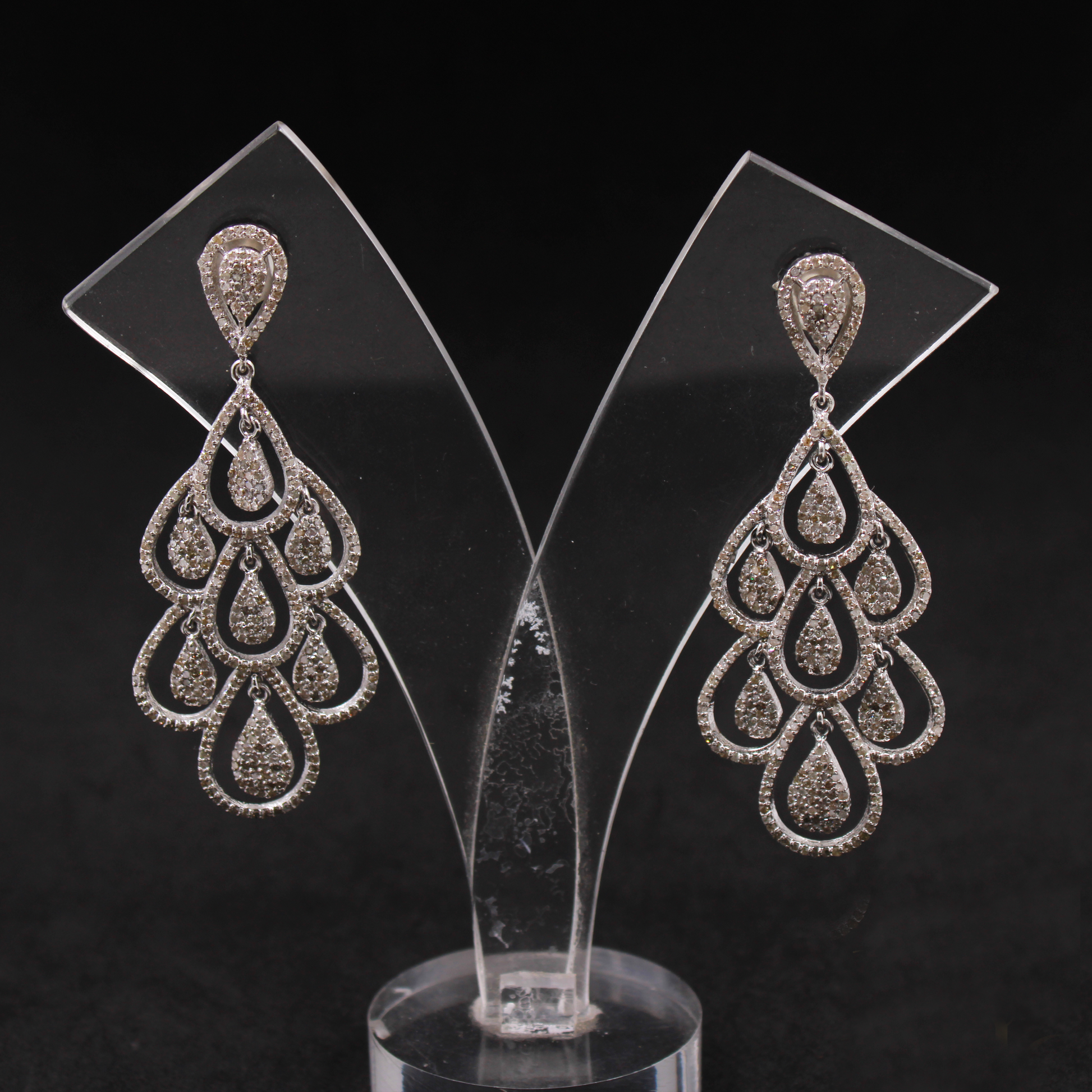 Sterling silver earrings with pave diamond teardrop shape