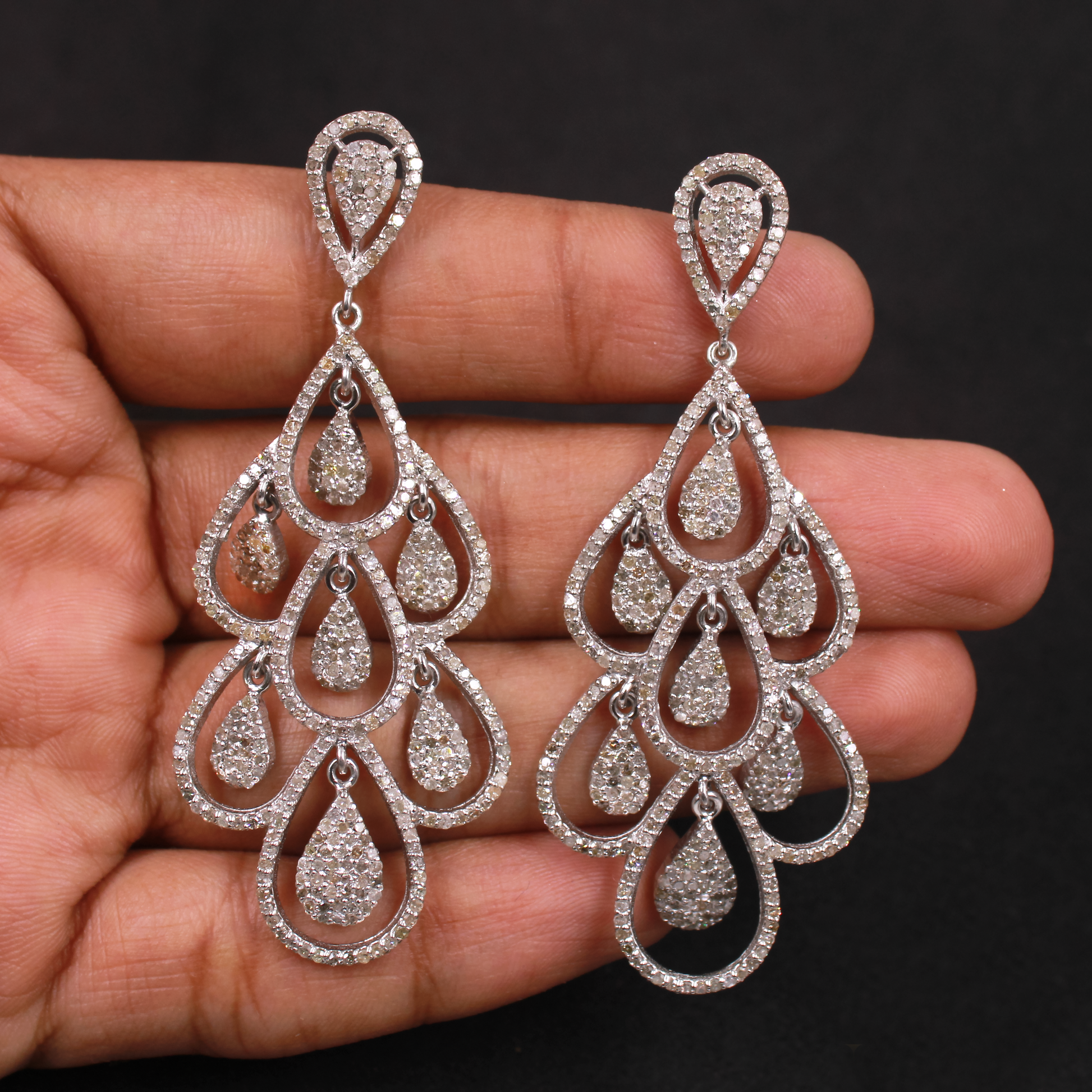 Handcrafted pave diamond earrings with polished silver finish