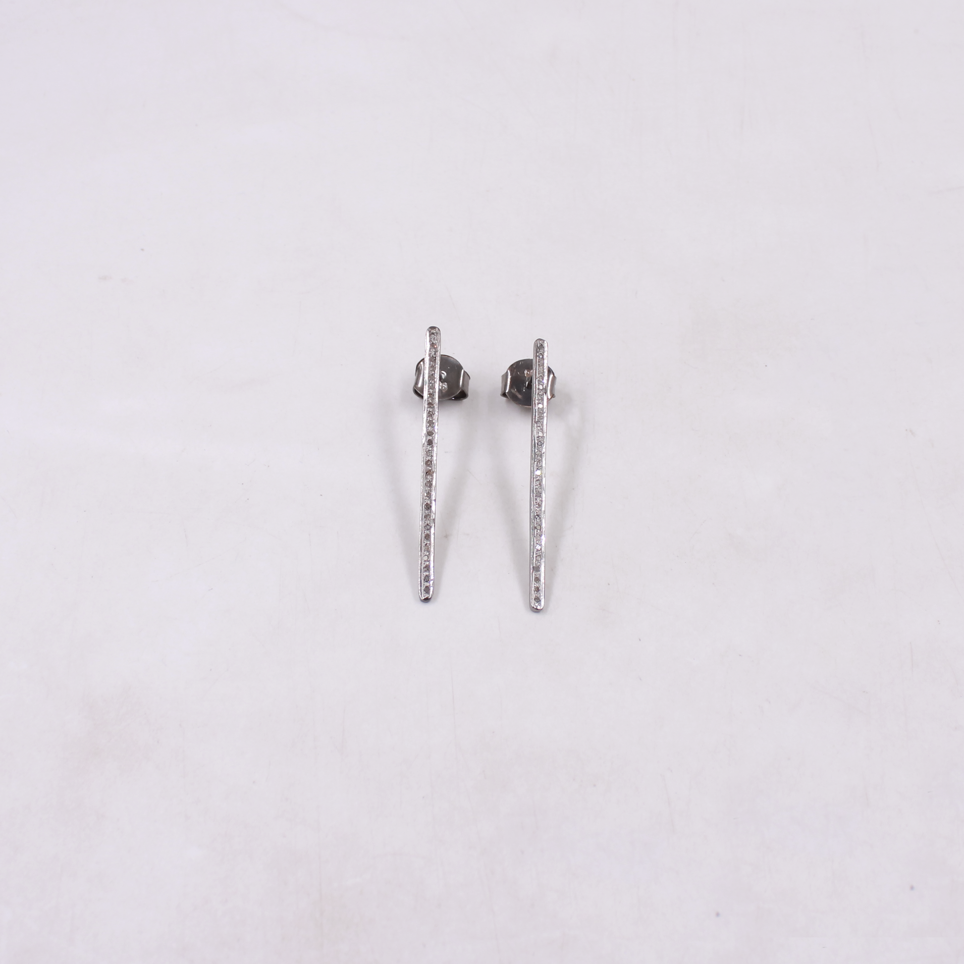 Modern diamond bar earrings as a luxury gift for her