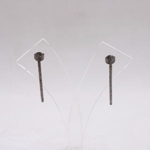Minimalist diamond drop earrings with rhodium polish