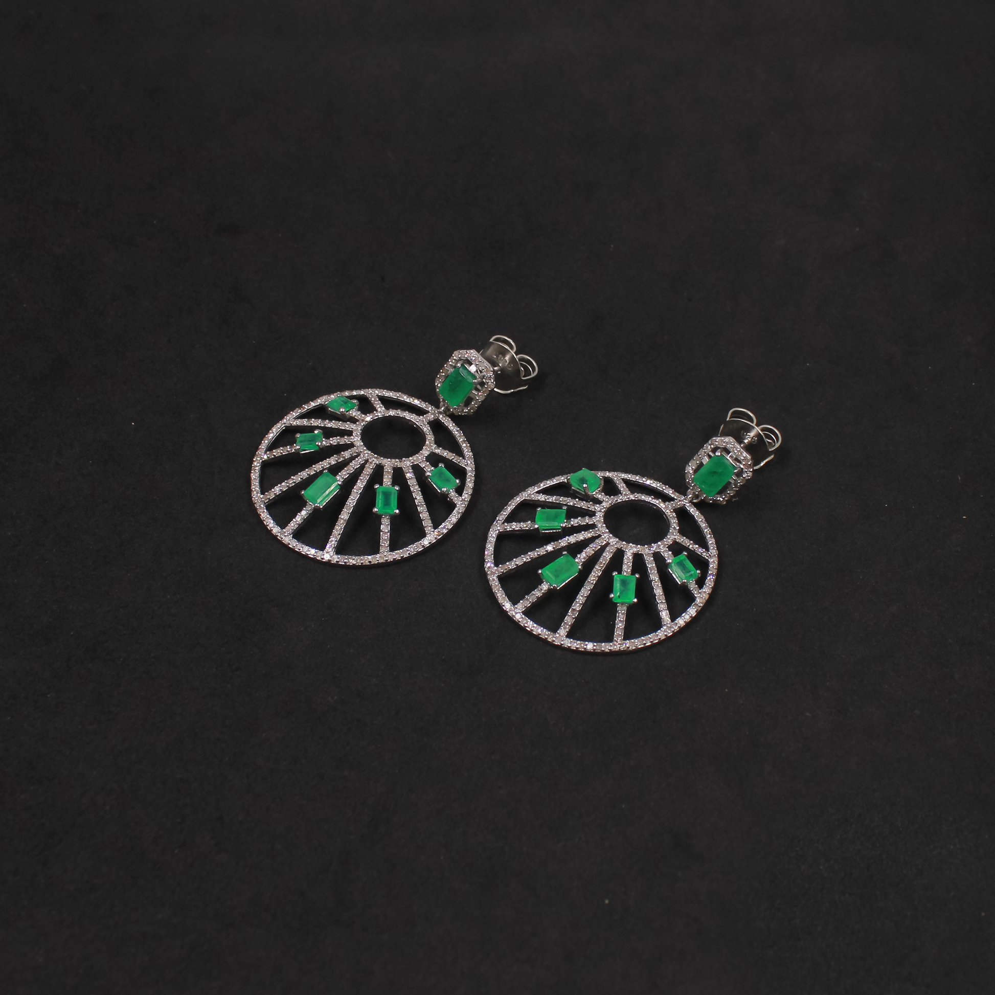 Luxury sterling silver emerald and diamond earrings with rhodium finish