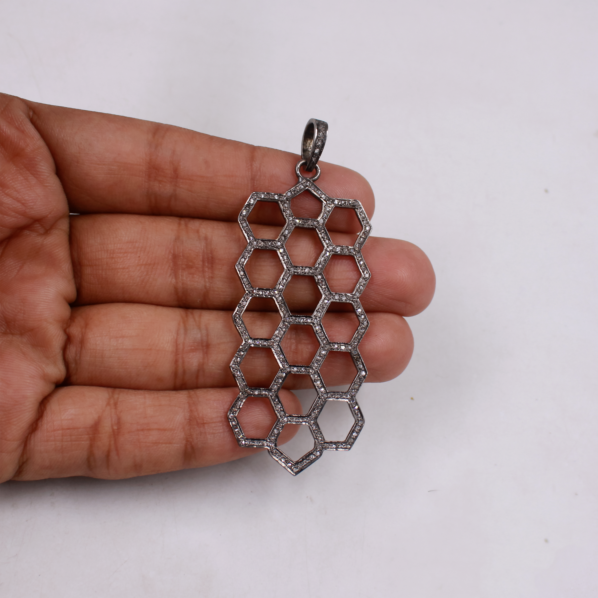Lightweight diamond pendant in sterling silver jewelry
