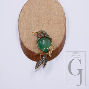 Designer emerald bird jewelry with detailed craftsmanship