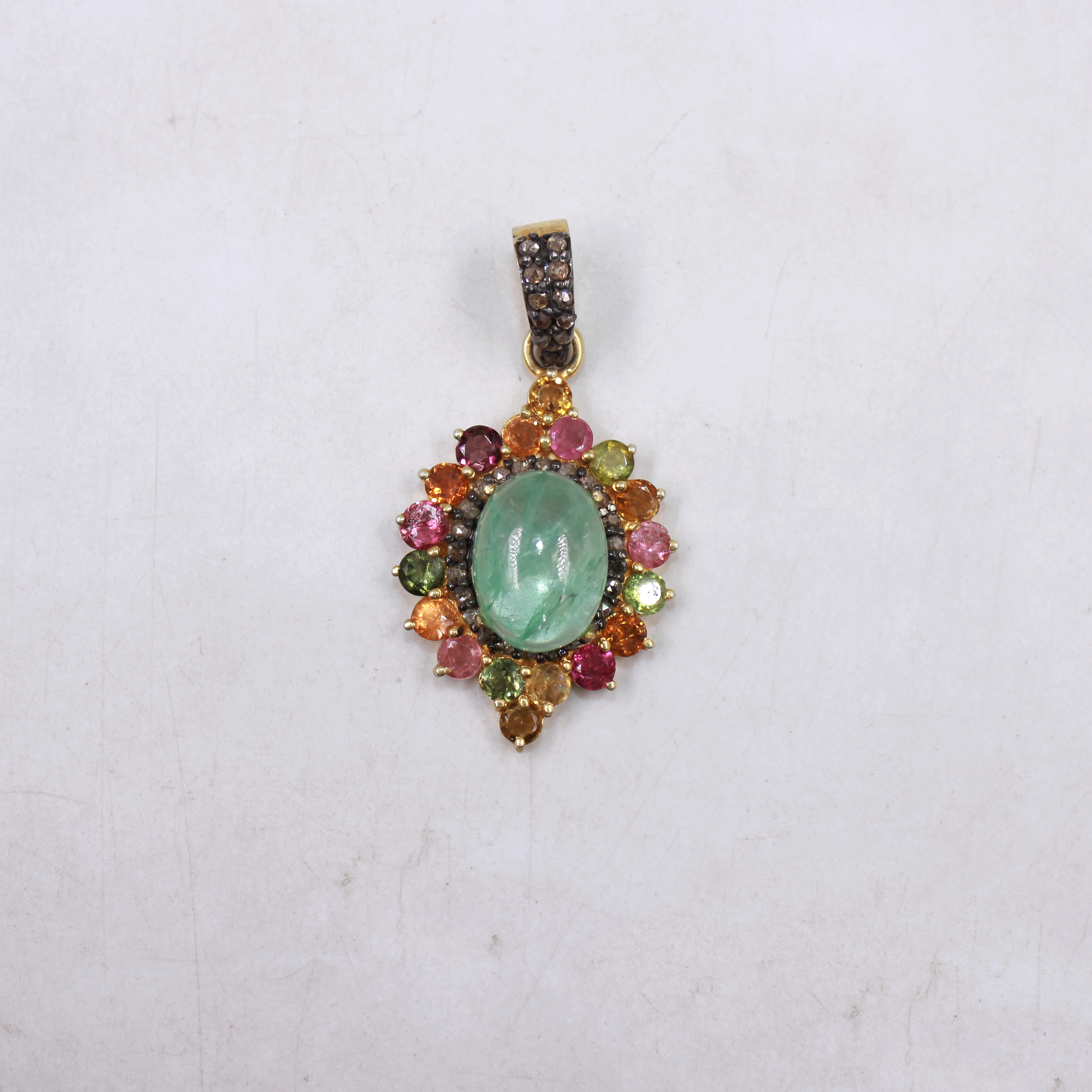 Gold-plated sterling silver pendant with Barriel emerald centerpiece