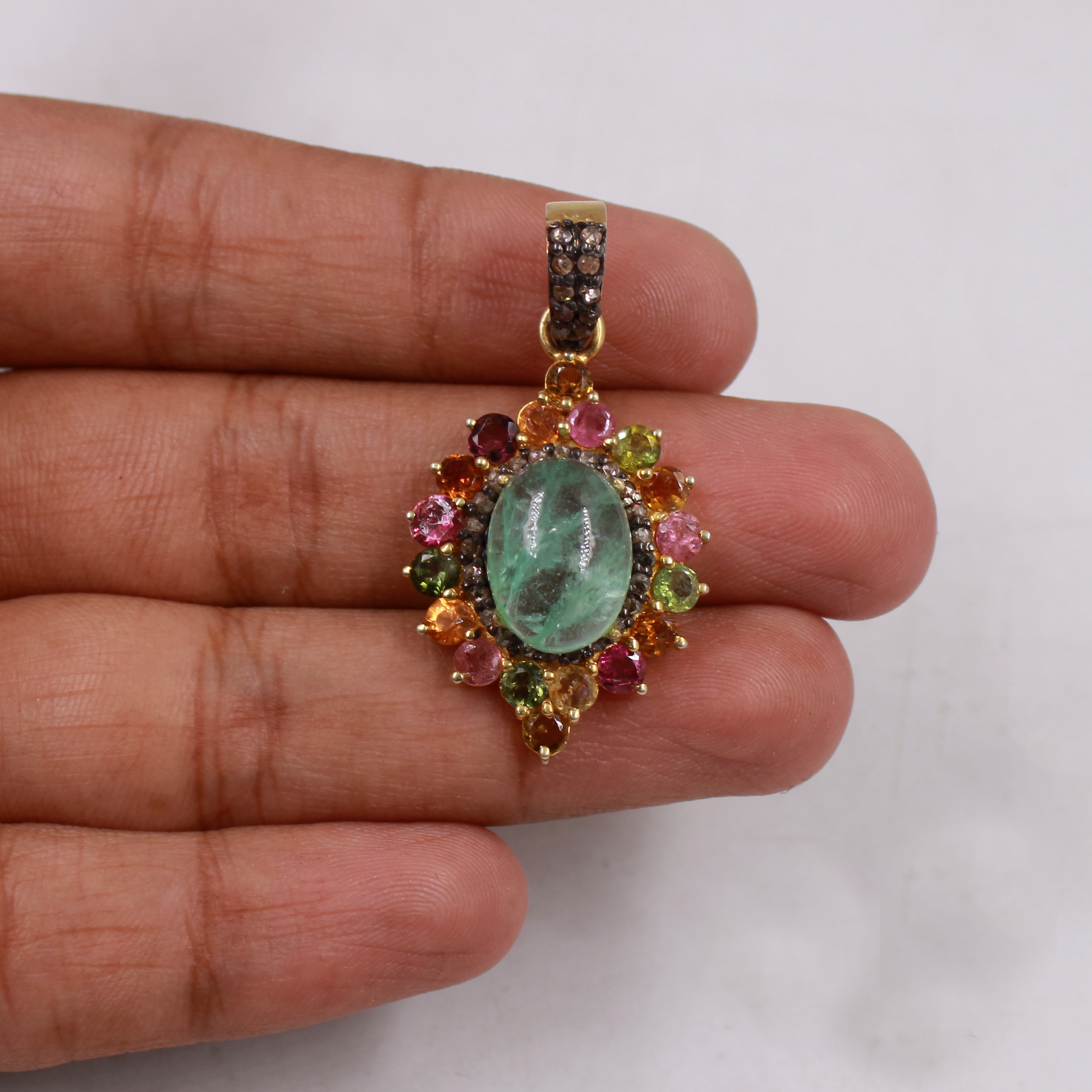 Oval Barriel emerald and pave diamond designer pendant