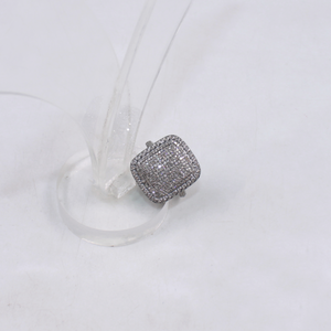 Silver ring with gemstones on a white background