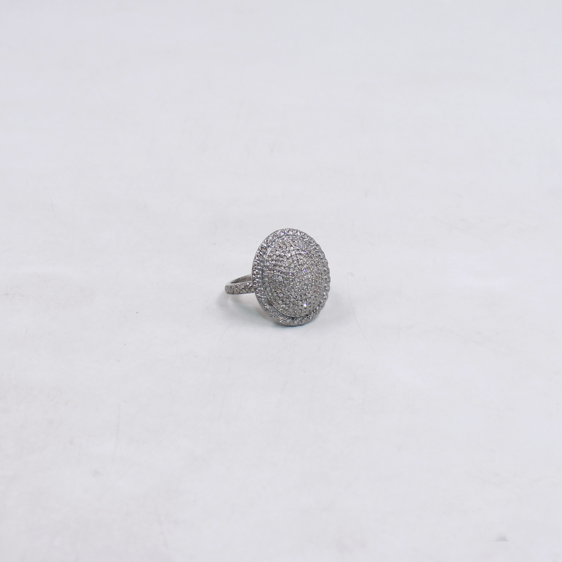 Bold sterling silver ring with sparkling pave diamonds