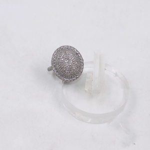Silver ring with gemstones on a white background