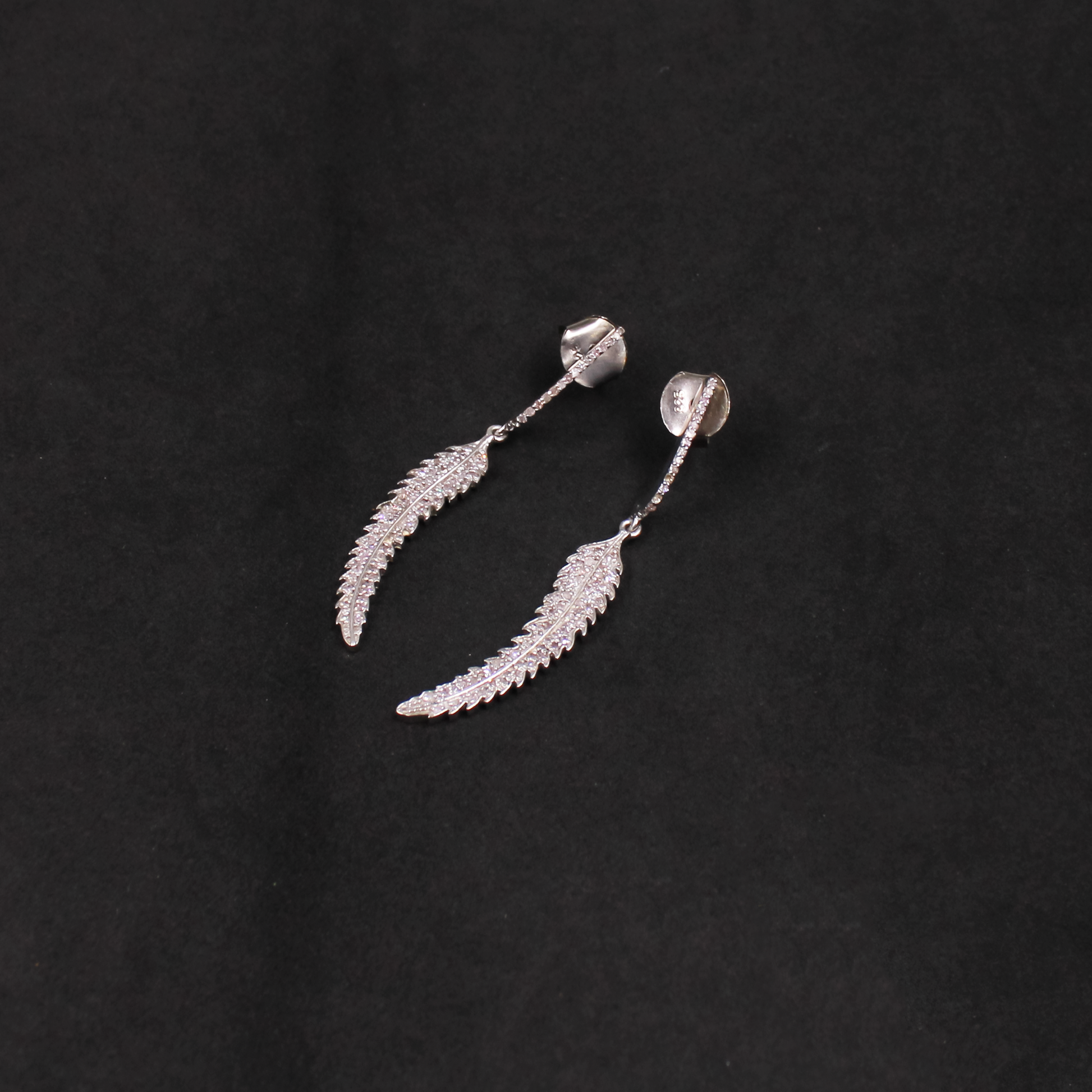 Elegant leaf design diamond earrings with rhodium plating