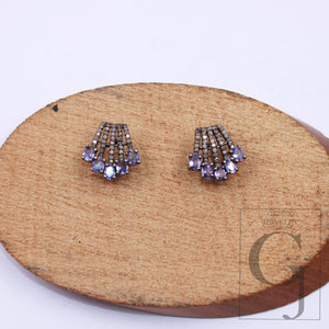 Close-up showing craftsmanship in 925 silver diamond and tanzanite earrings.