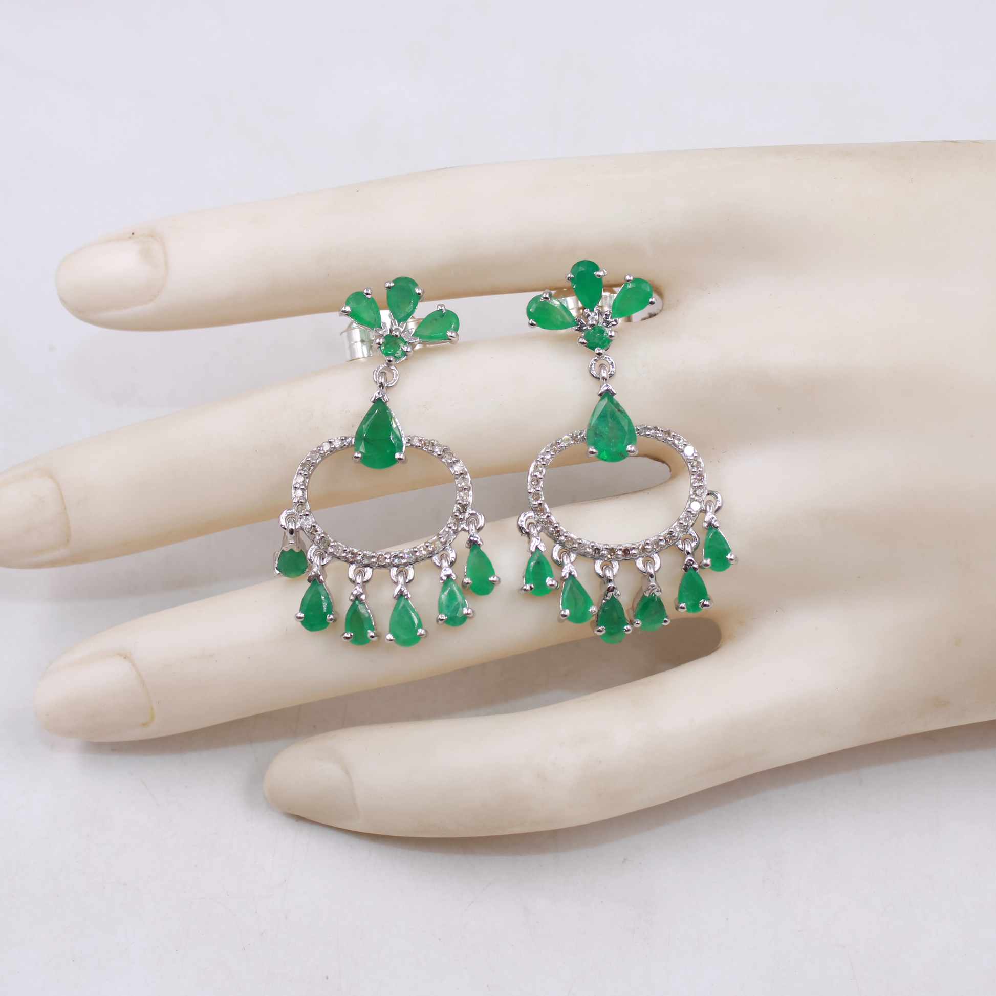 Elegant emerald chandelier earrings with natural pave diamonds