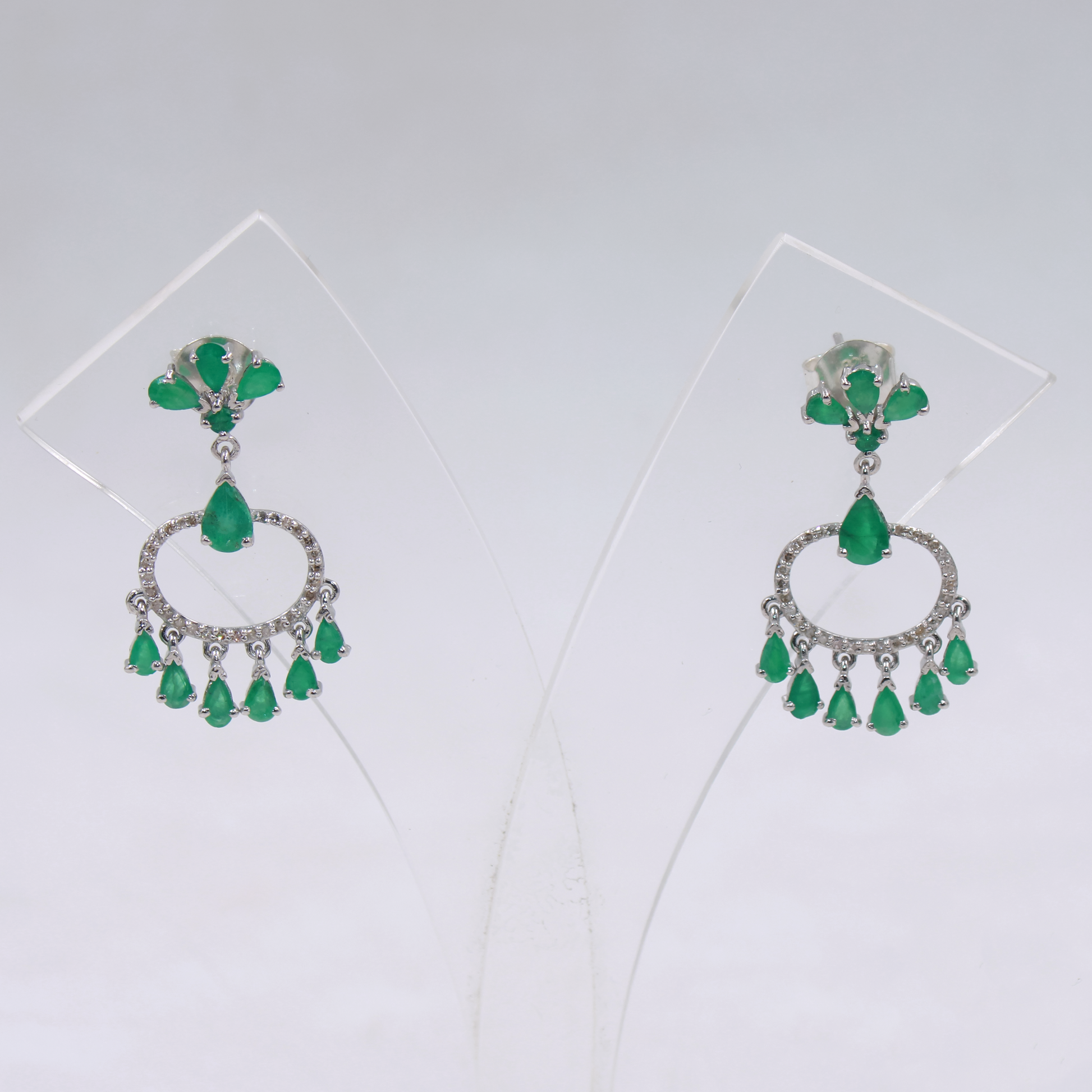 Handcrafted emerald and diamond earrings for special occasions