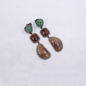 Long gemstone chandelier earrings with emeralds, rubies, and sapphires