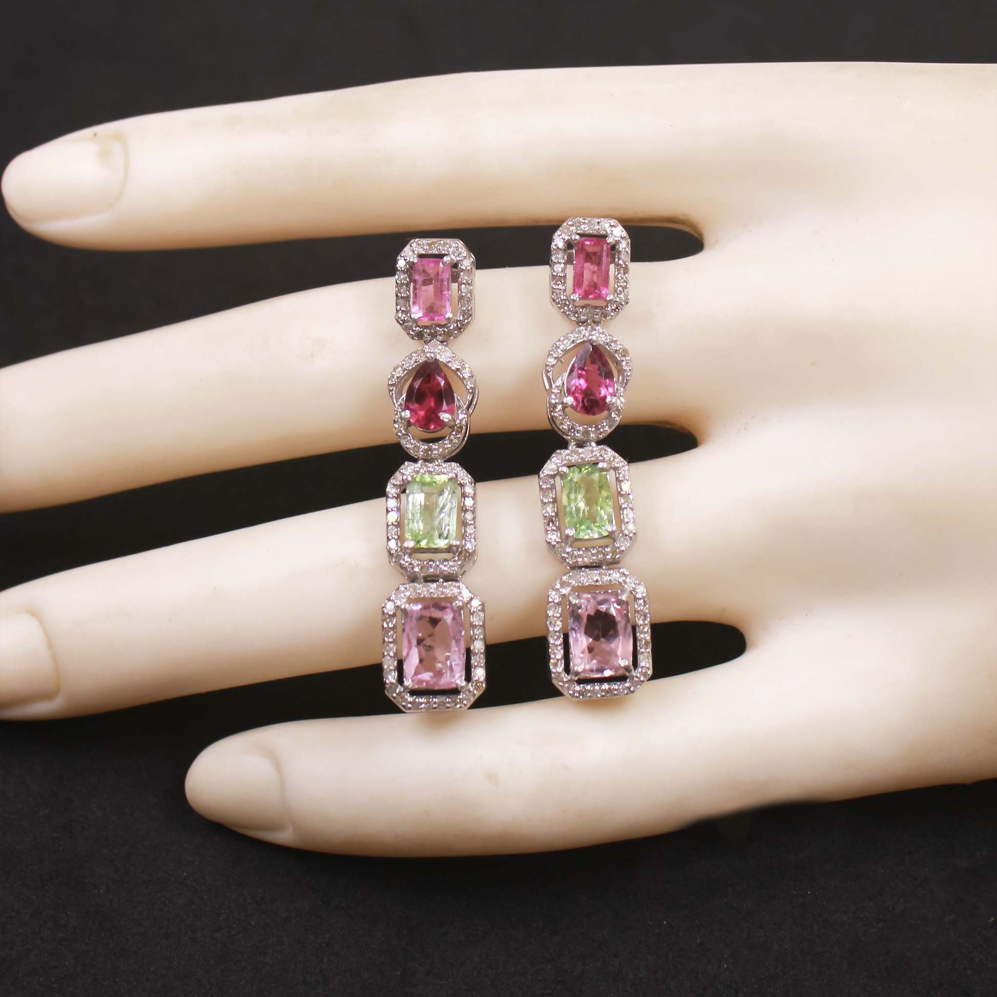 Handmade gemstone dangle earrings with pink, red, and green tourmalines