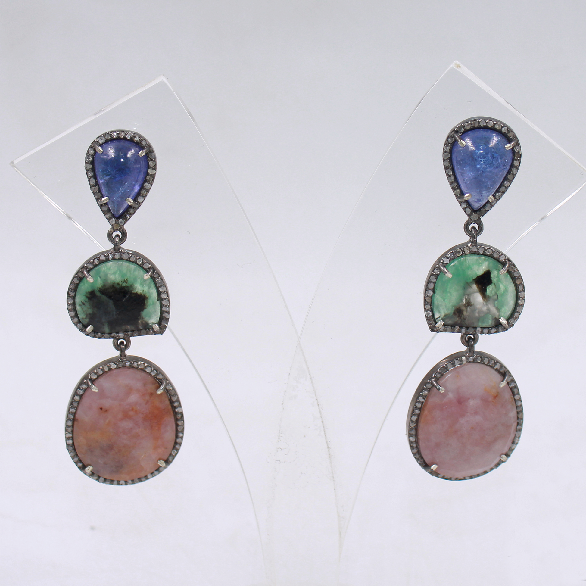 Exquisite handcrafted earrings with Tanzanite, Emerald, Sapphire, and Diamond detailing