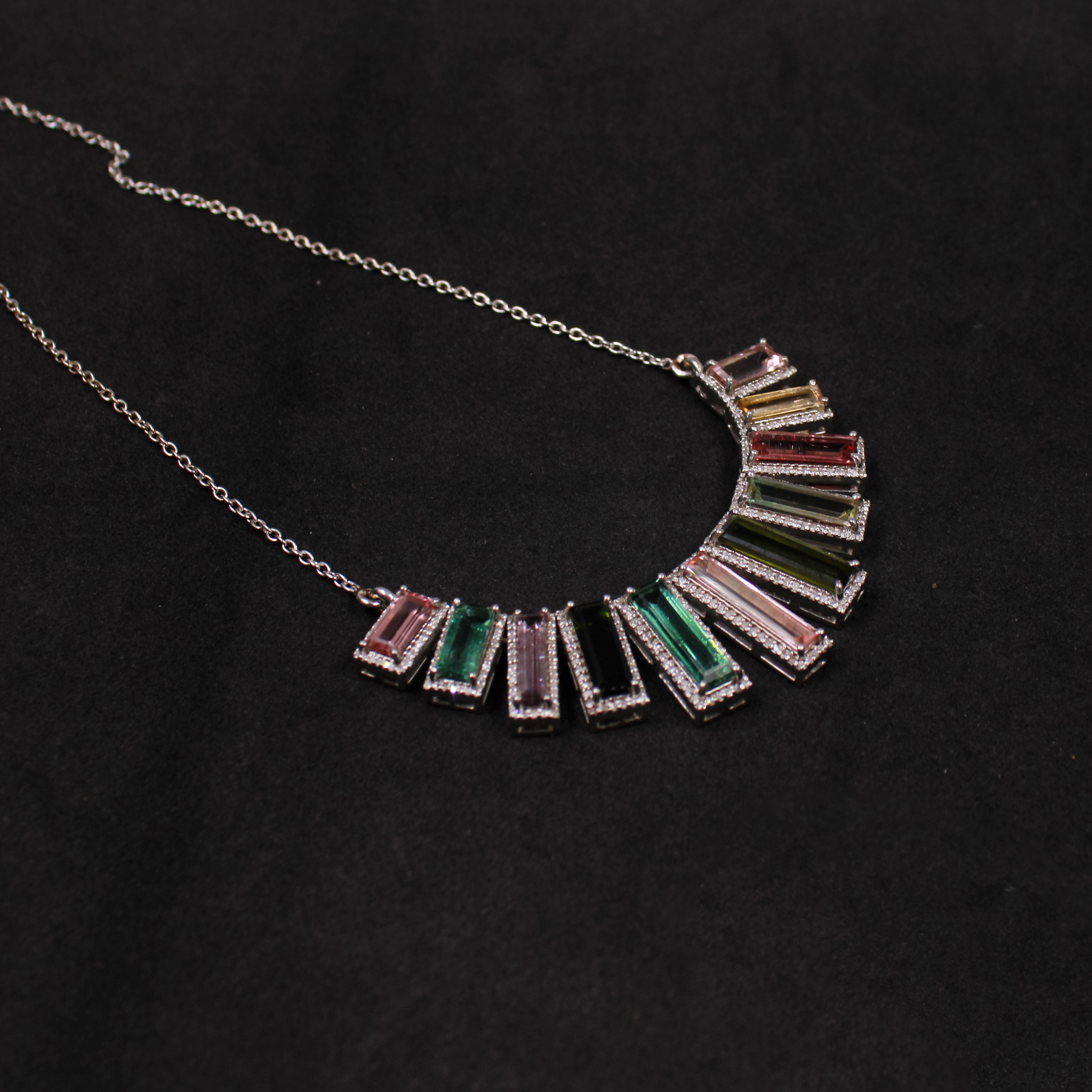 Elegant silver necklace with multicolor tourmaline and diamond accents