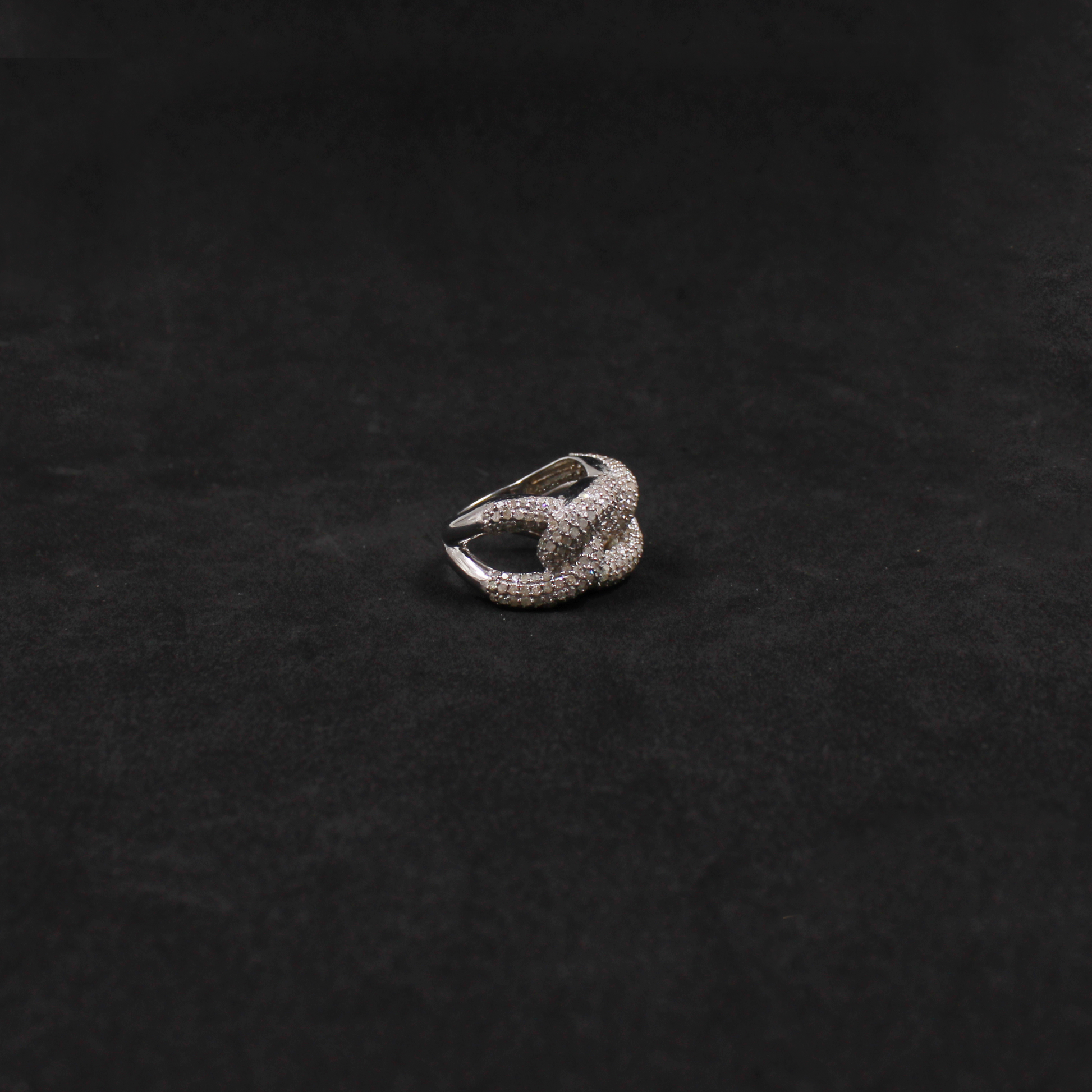 Luxury sterling silver ring with natural pave diamond detailing