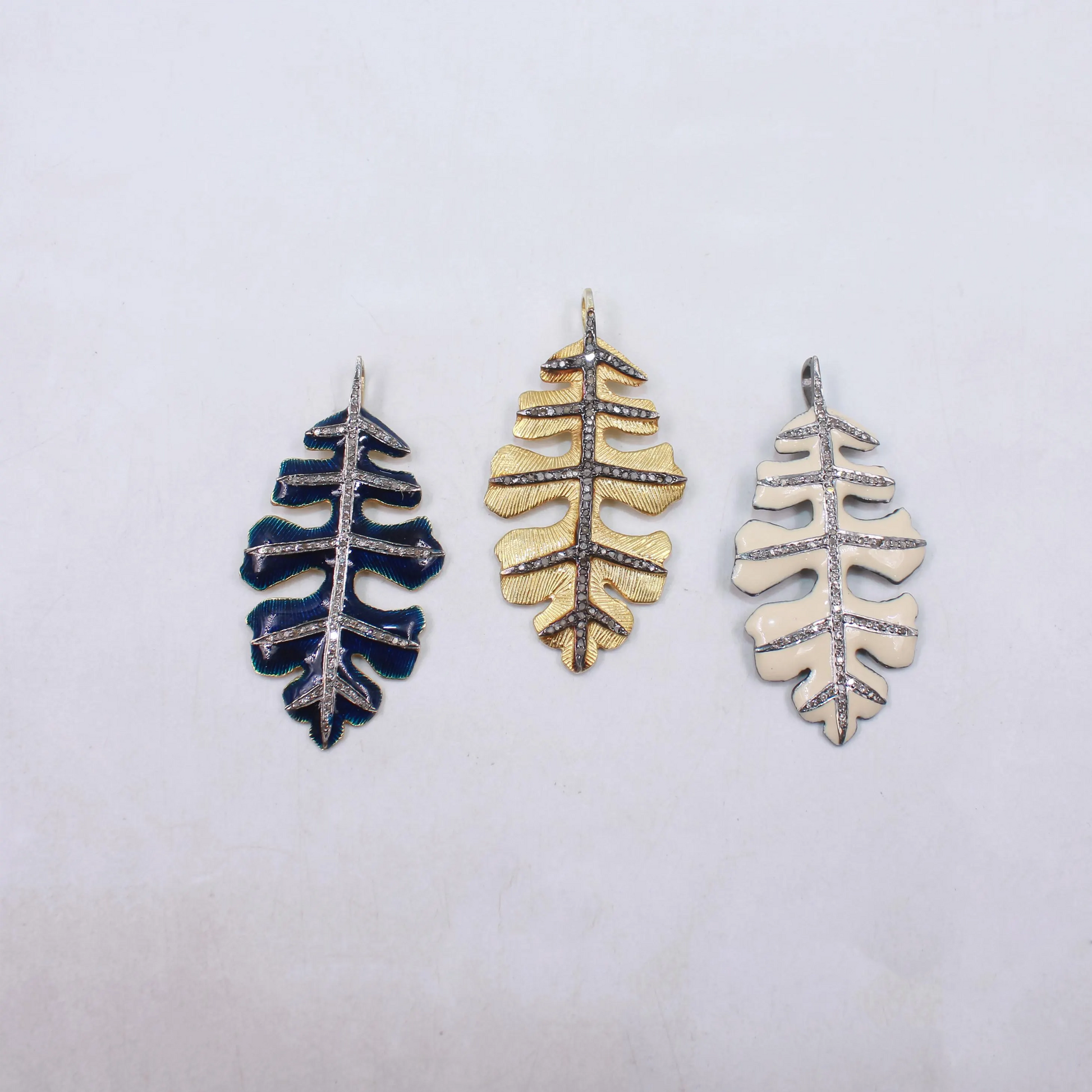 Black enamel leaf pendant with diamonds in sterling silver gold plating