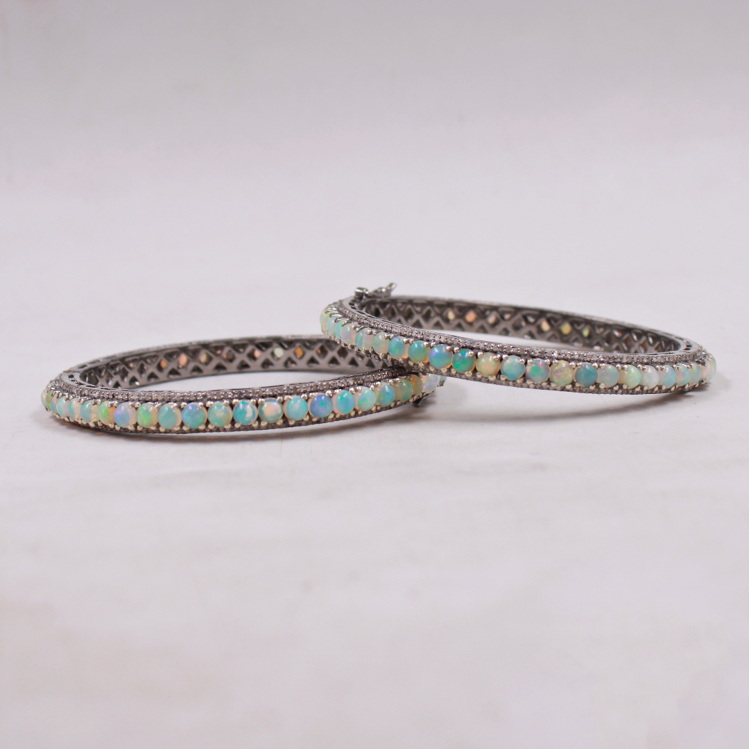 "Unique Ethiopian Opal Bracelet with Fiery Play-of-Color and Diamond Detailing"