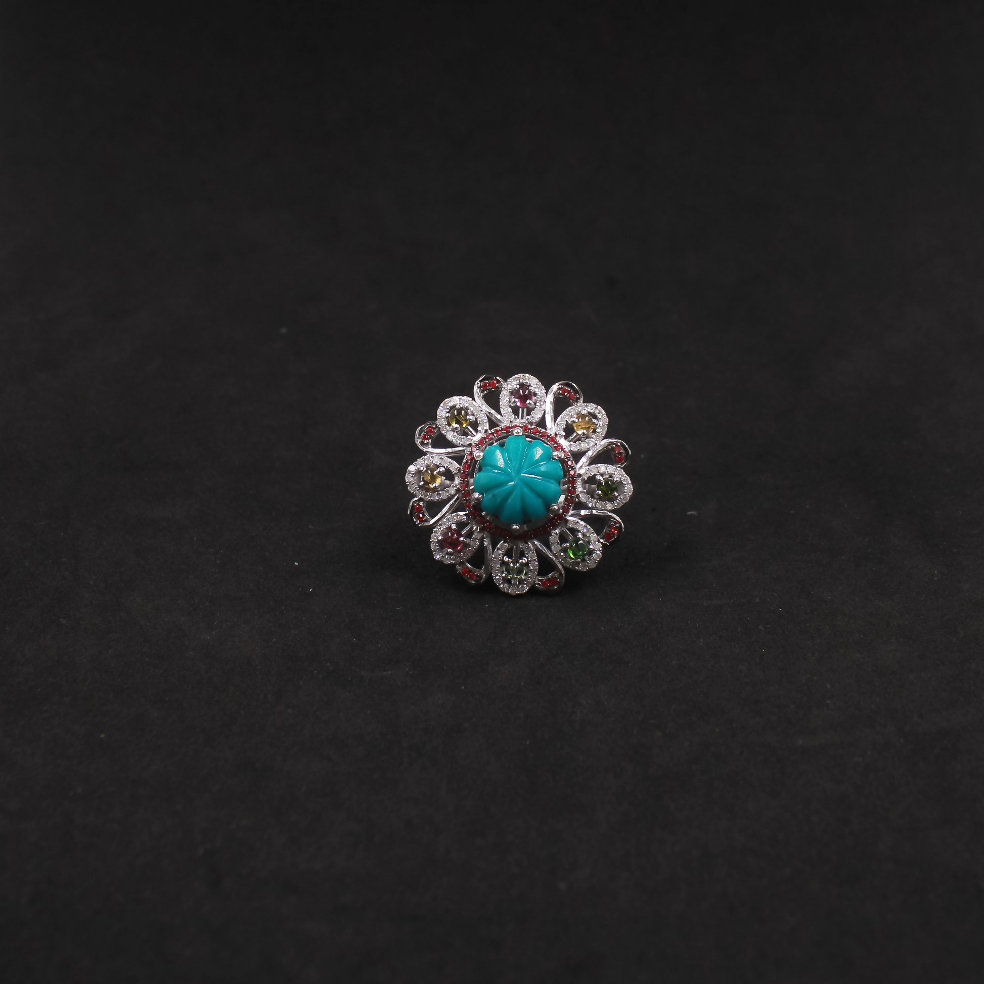 Handmade gemstone ring with turquoise, ruby and diamonds