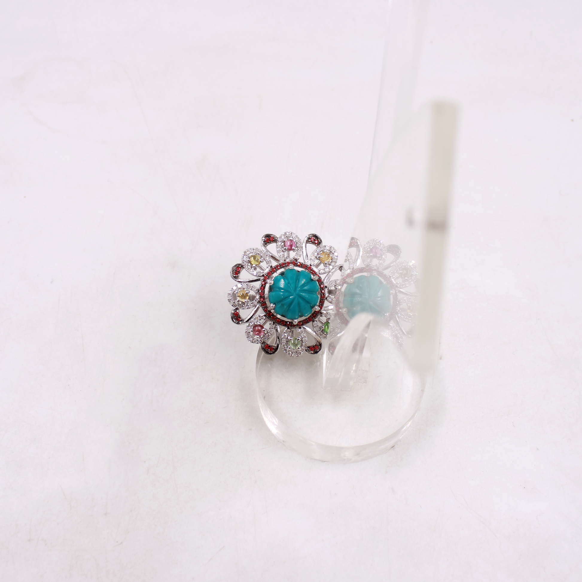 Colorful gemstone jewelry ring with turquoise and ruby