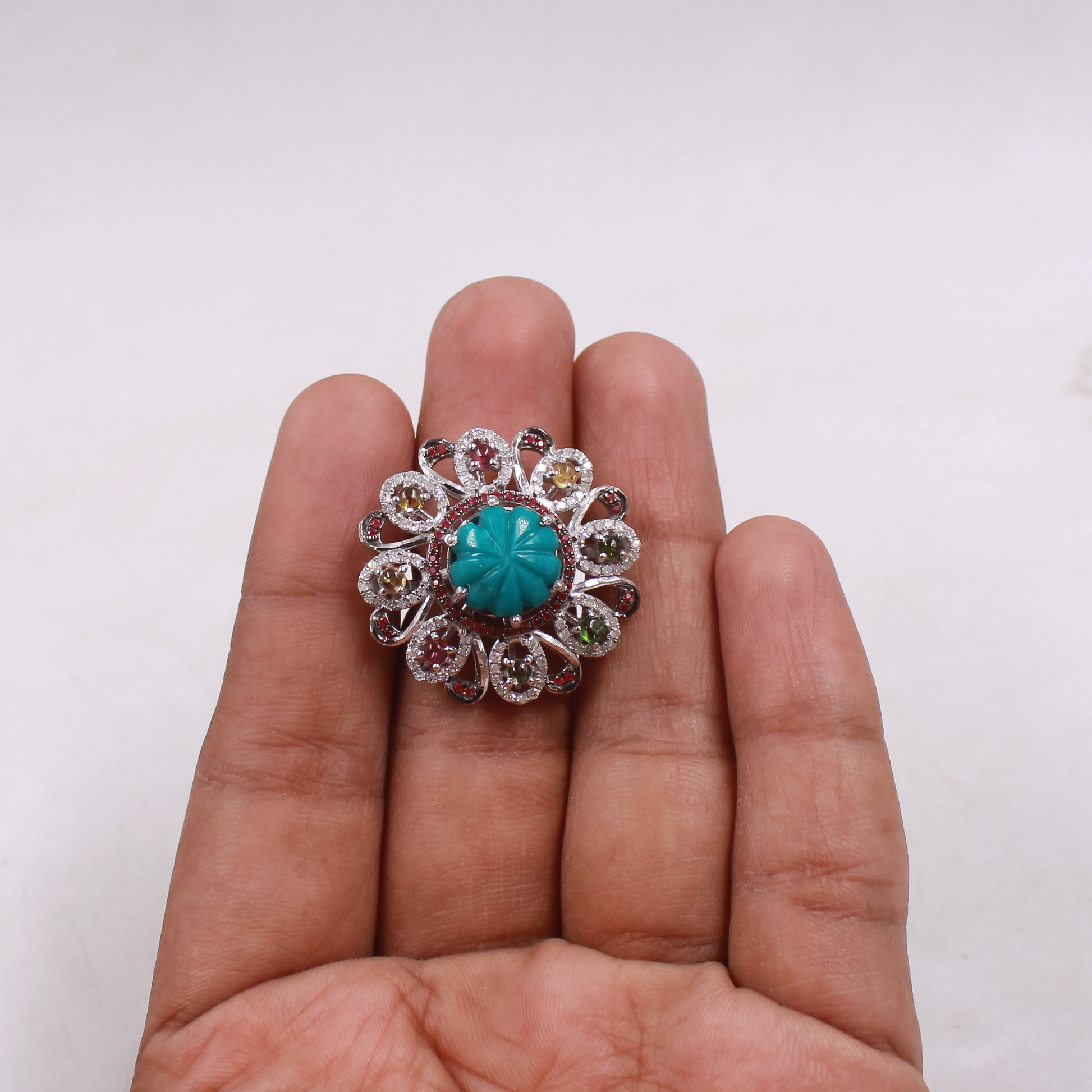 Colorful silver ring featuring turquoise, ruby and multi-tourmalines