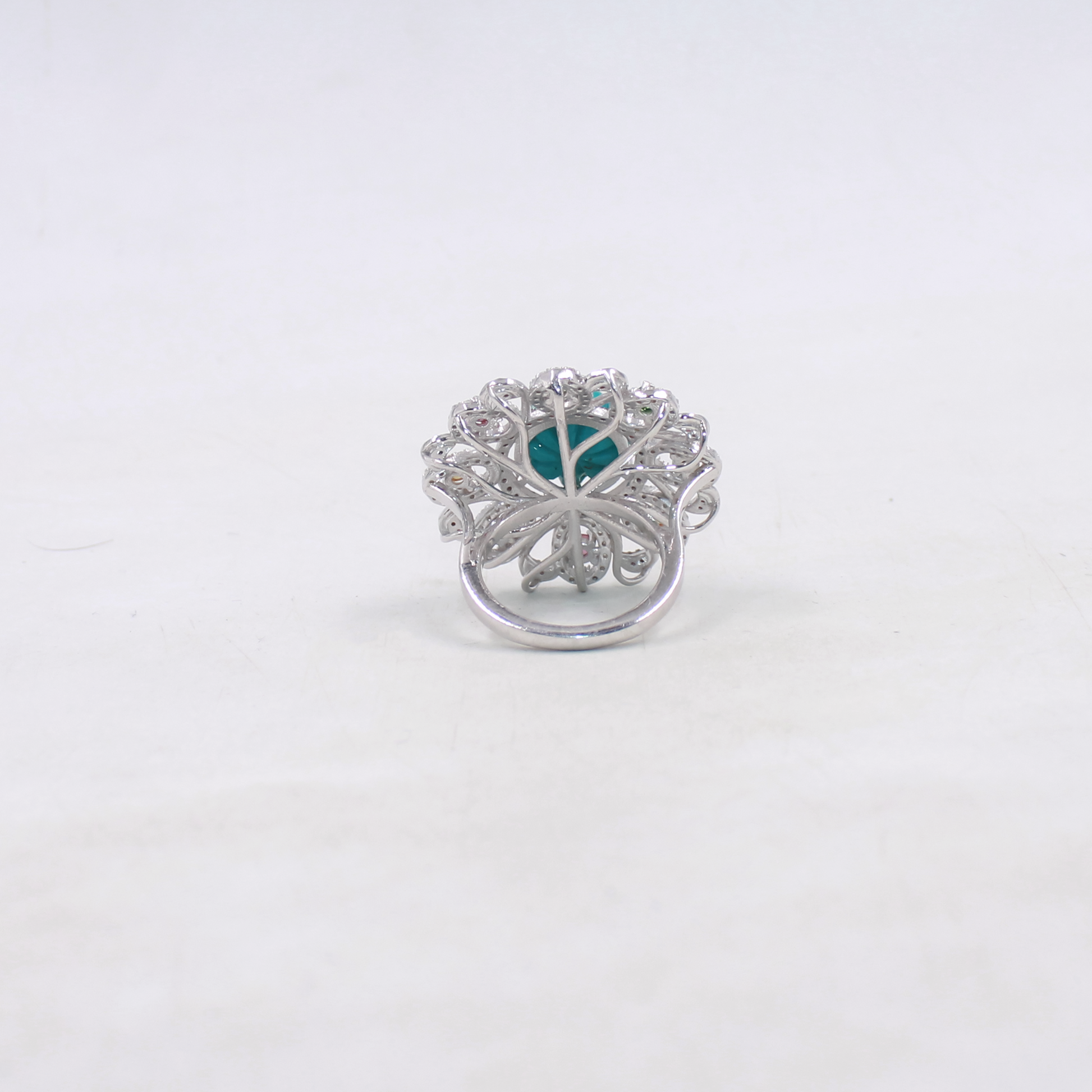 Unique cocktail ring with turquoise, ruby and diamond sparkle