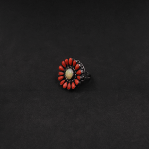 Handcrafted sterling silver ring with Ethiopian Opal, Coral, and Diamond accents