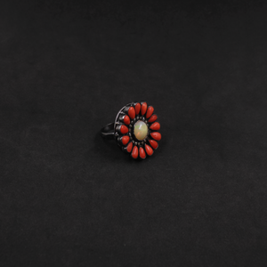 Bold gemstone ring featuring Opal center, Coral petals, and pave diamonds