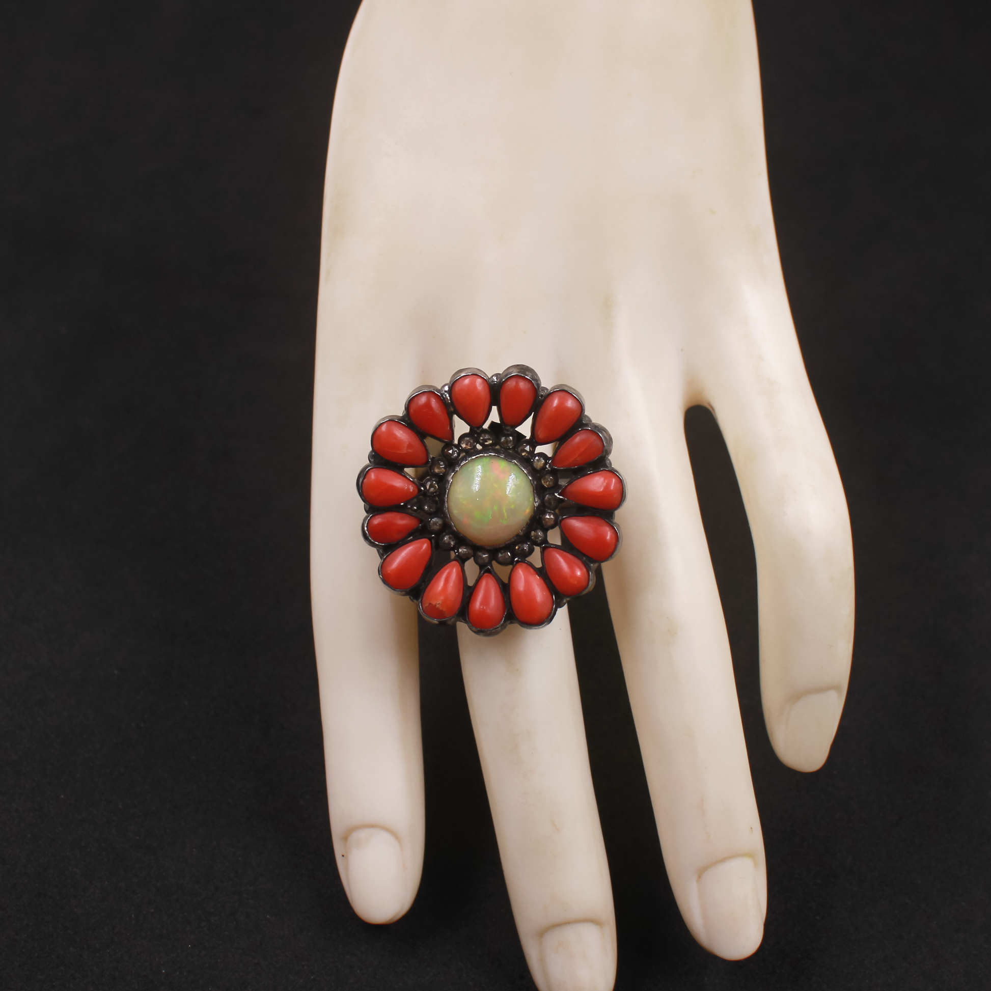 Unique gemstone ring featuring Ethiopian Opal, Coral cabochons, and Diamonds