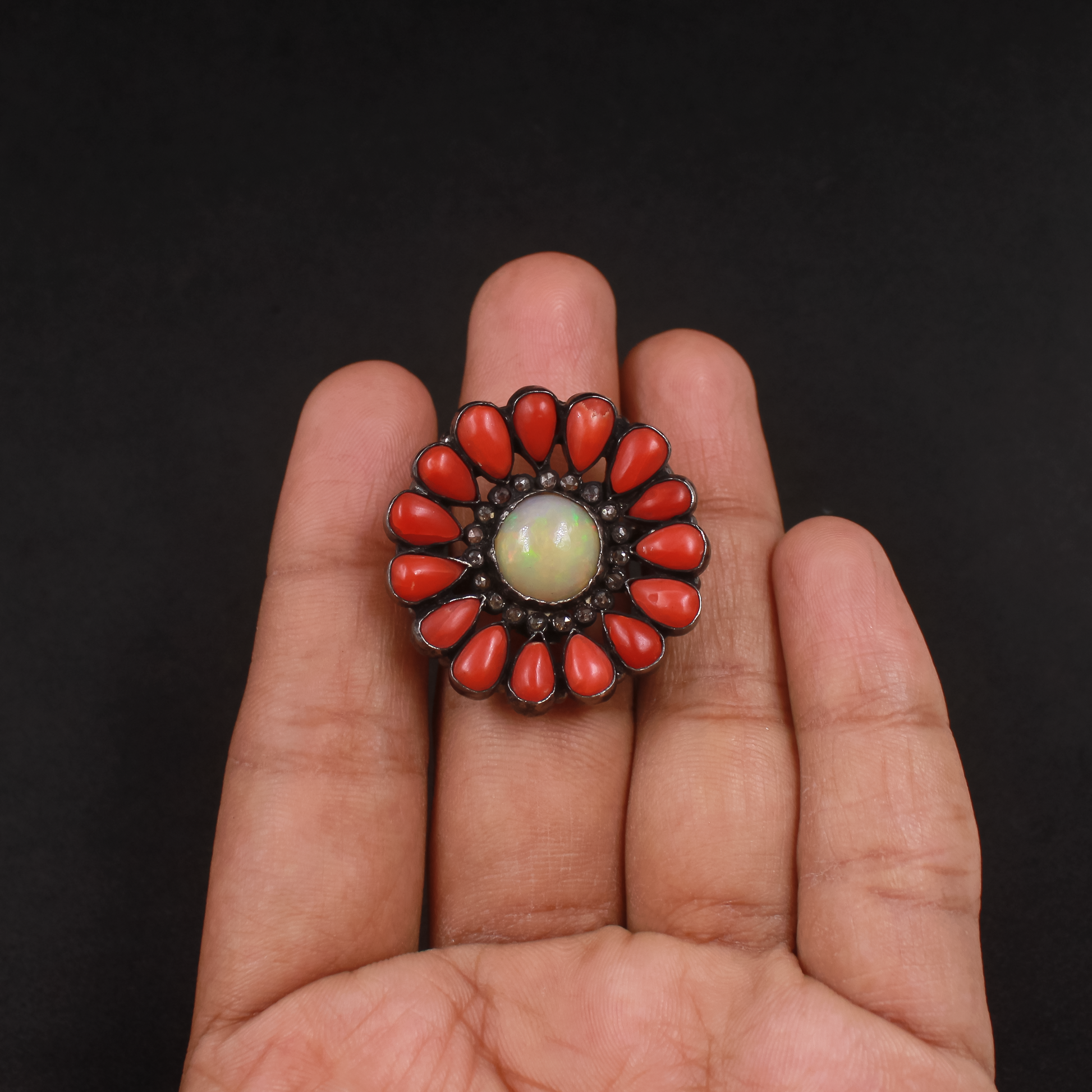 Vintage-inspired Ethiopian Opal ring with Coral halo and pave diamonds