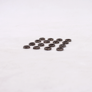 Blackened silver spacer beads featuring natural pavé diamonds.