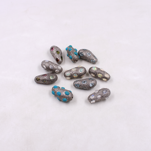 Oxidized silver bead set with natural gemstones and diamond detailing.