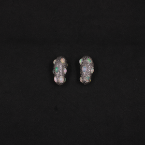 Rustic artisan bead featuring diamonds and opal gemstones in sterling silver.