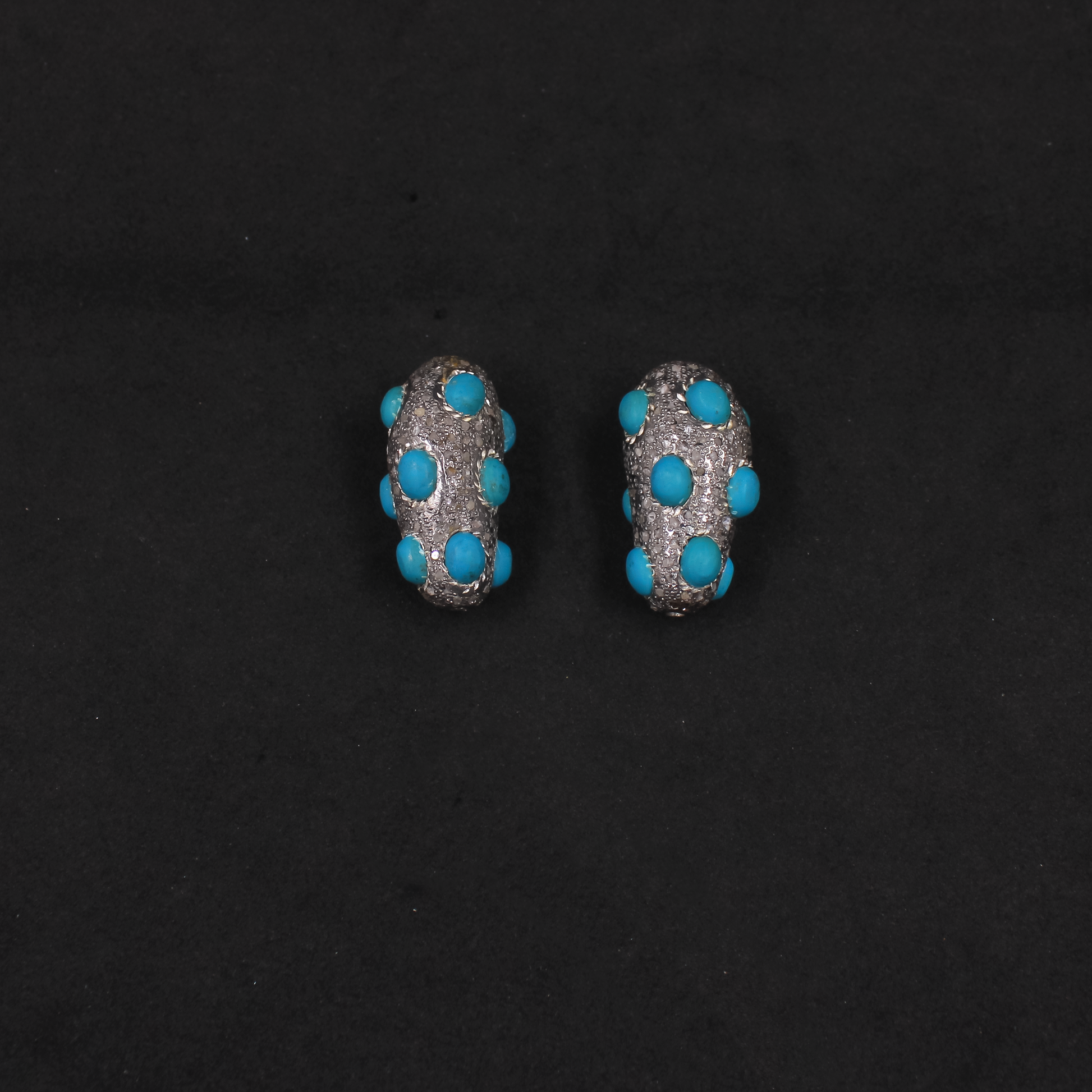 Luxury jewelry making bead with turquoise gemstone accents and diamond sparkle.
