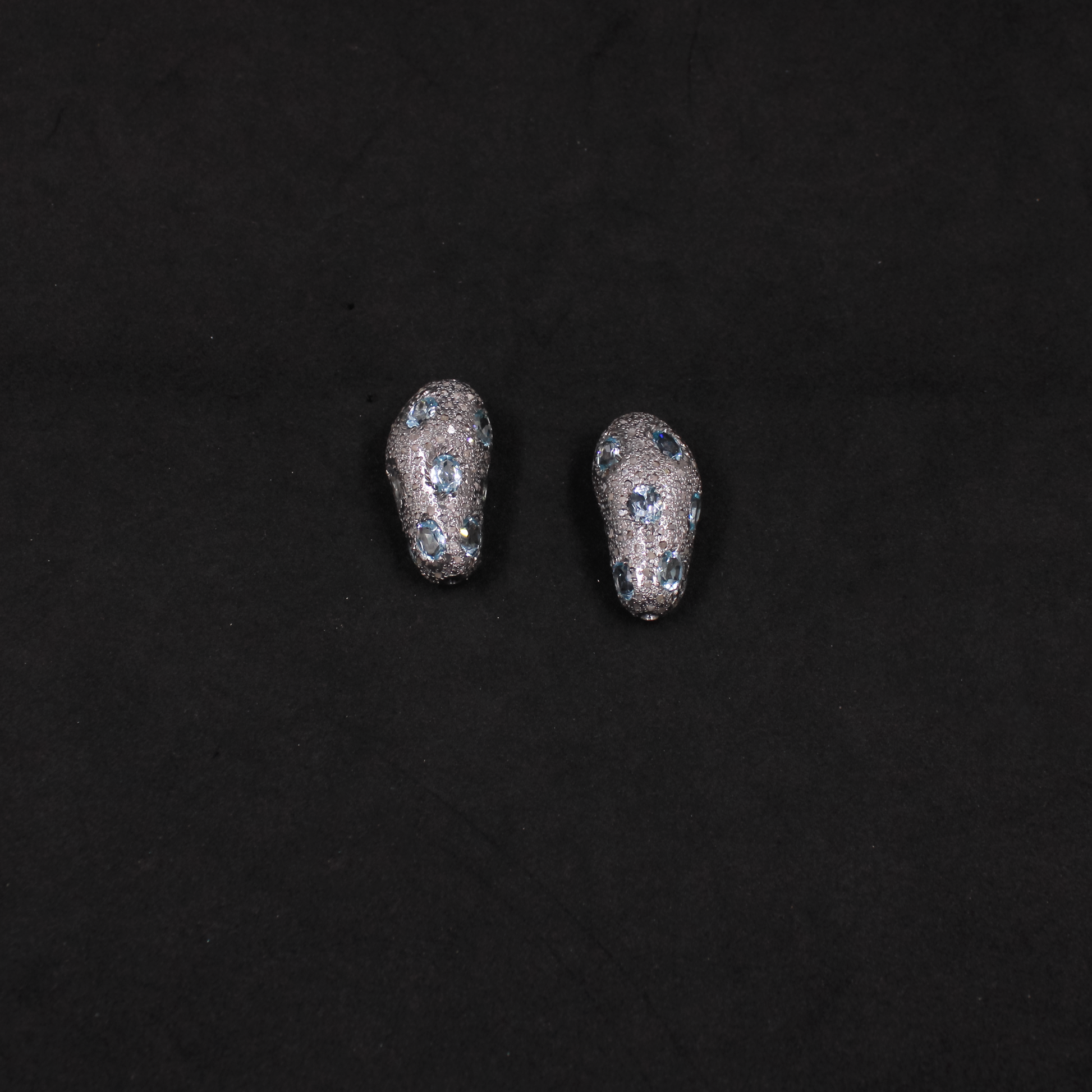 Unique artisan bead with pave diamonds and blue topaz gemstones for designers.