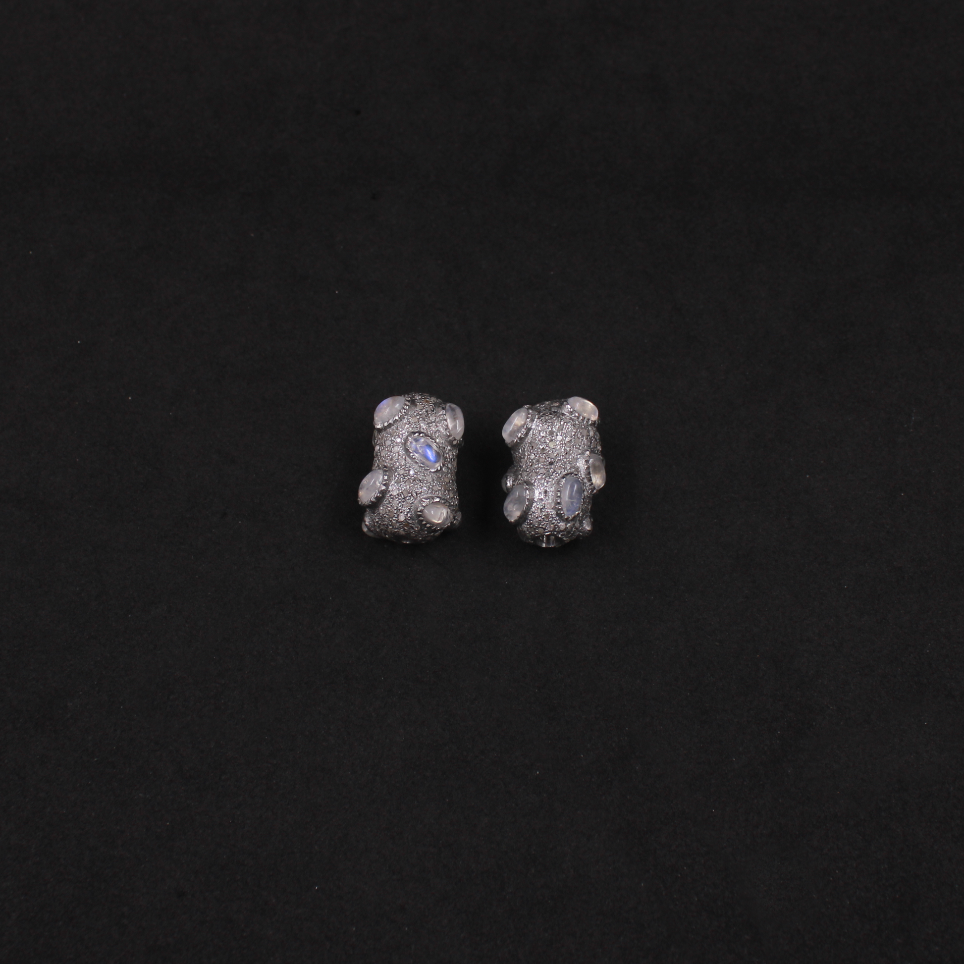 Luxury jewelry making beads featuring moonstone, and diamonds.