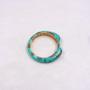 Statement dolphin bangle in sterling silver with gold plating and blue enamel