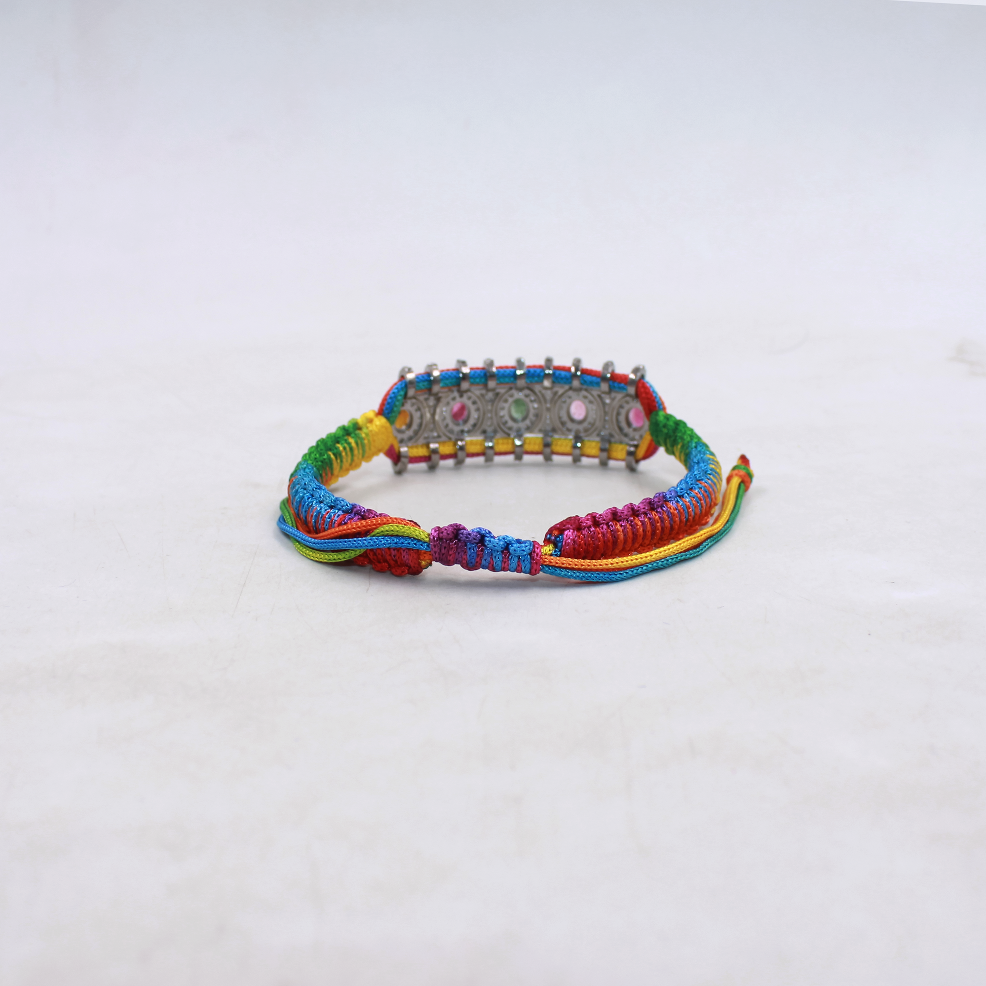Adjustable thread bracelet with multi tourmaline and diamond centerpiece